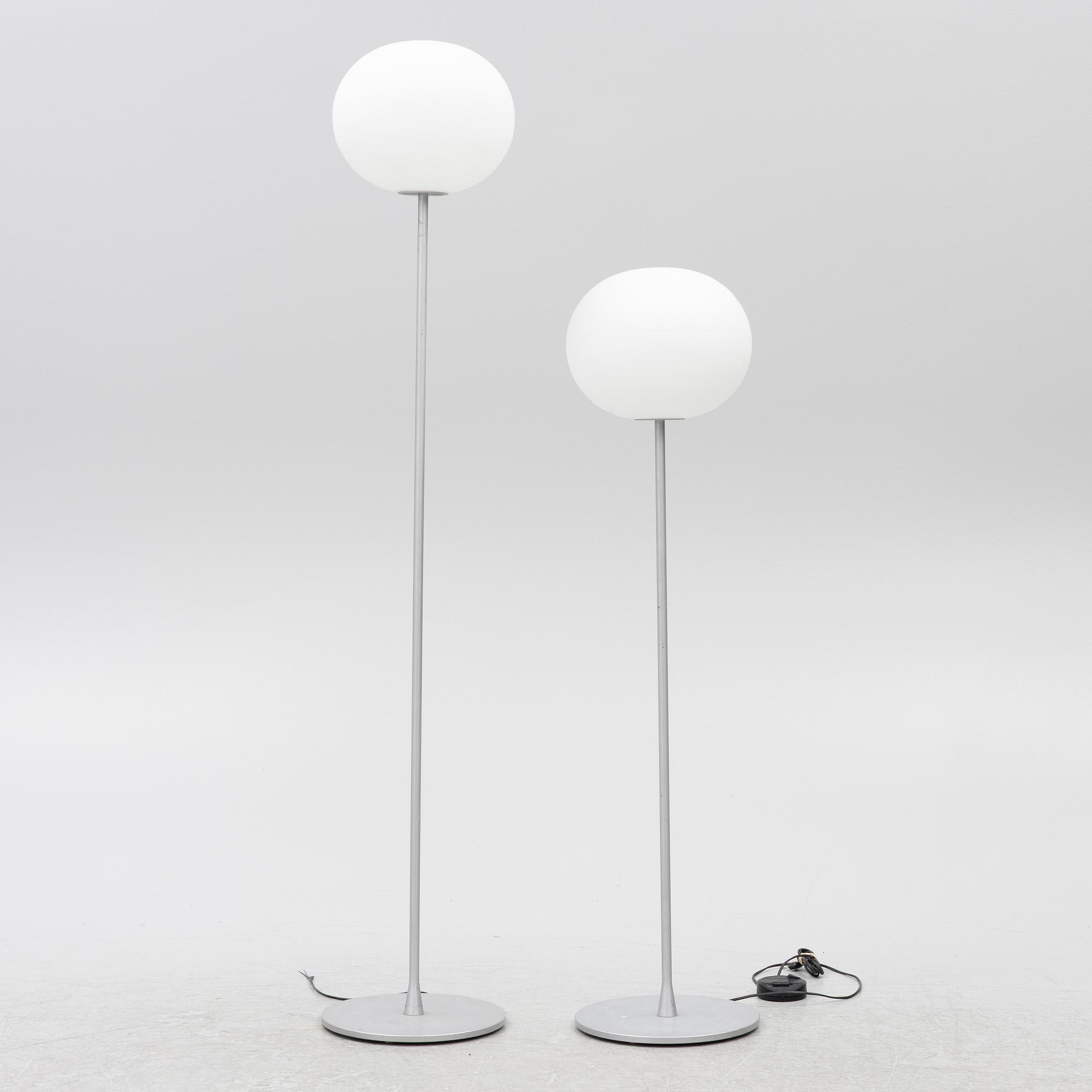 Jasper Morrison, a pair of 'Glo-ball' floor lamps, Flos, Italy.