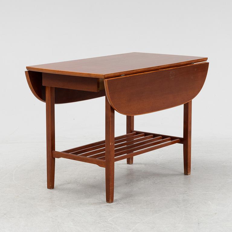 A mahogany side table, second half of the 20th Century.