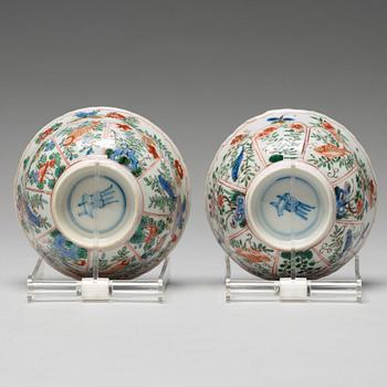 A pair of large famille verte cups with saucers, Qing dynasty, Kangxi (1662-1722).