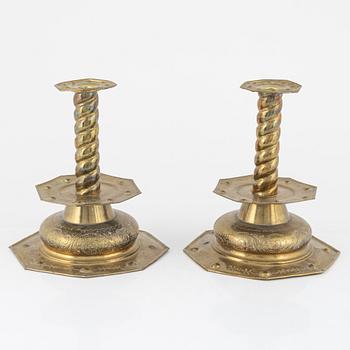 A pair of brass candlesticks, Baroque style, circa 1900.