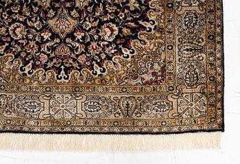 A Ghom, silk rug, c. 162 x 102 cm.