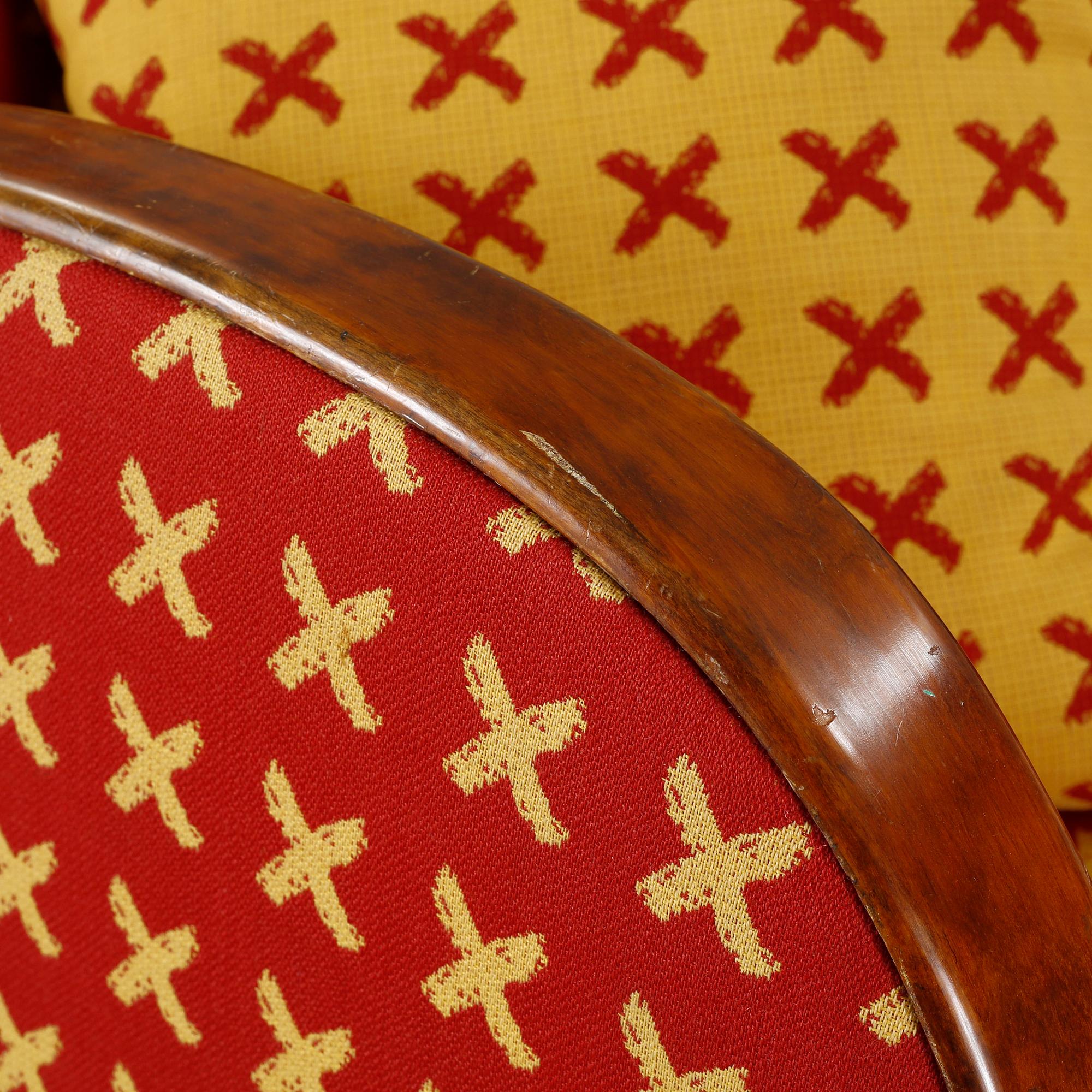 A pair of 1930s armchairs.