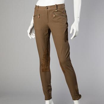 Three pair of trosers by Ralph Lauren.