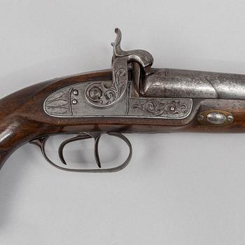 A double-barrelled percussion pistol, second half of the 19th century.