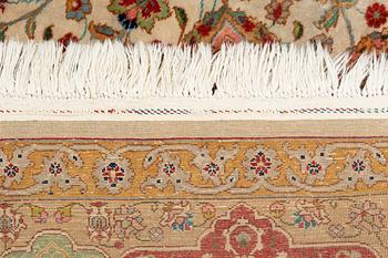 A carpet, semi-antique, Tabriz, ca 298 x  228 cm.