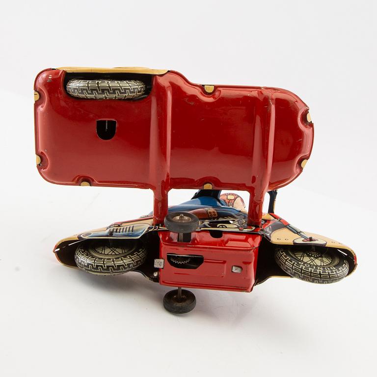 Toy motorcycle with sidecar. Huki Germany mid-20th century lithographed tin.