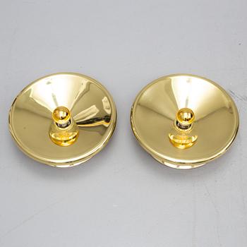 TOM DIXON, a pair of brass wall lamps.