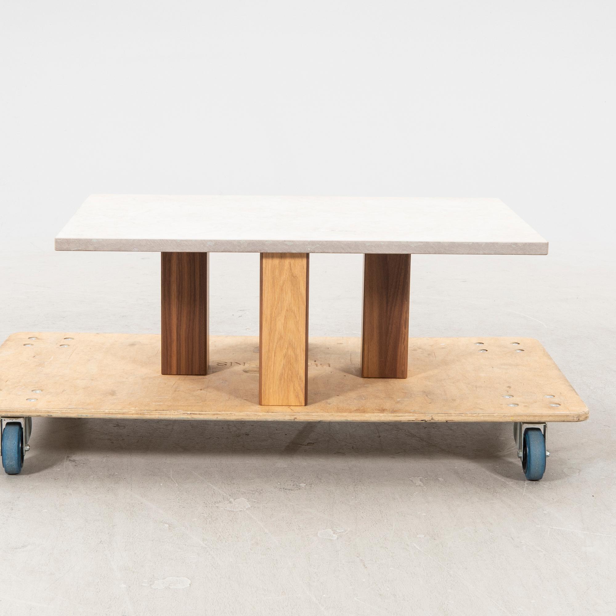 A 21st century limestone coffee table.