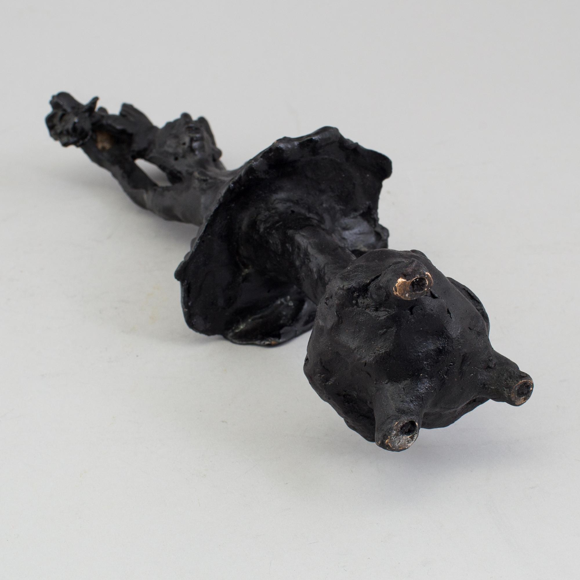 A bronze sculpture by Karin Lind, not signed.