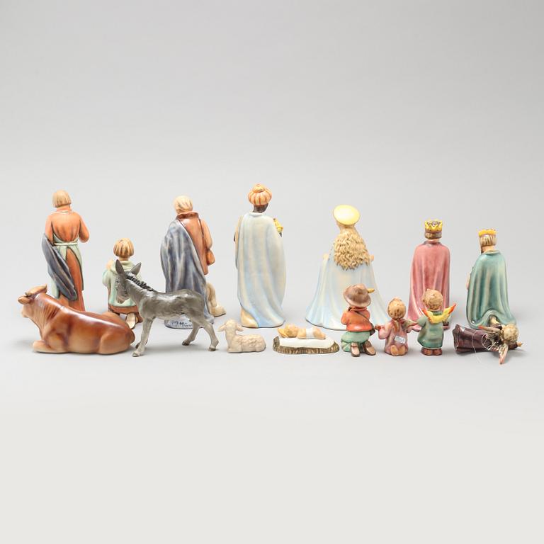 15 porcelain figurines, designed by MI Hummel for Goebel, late 20th century.