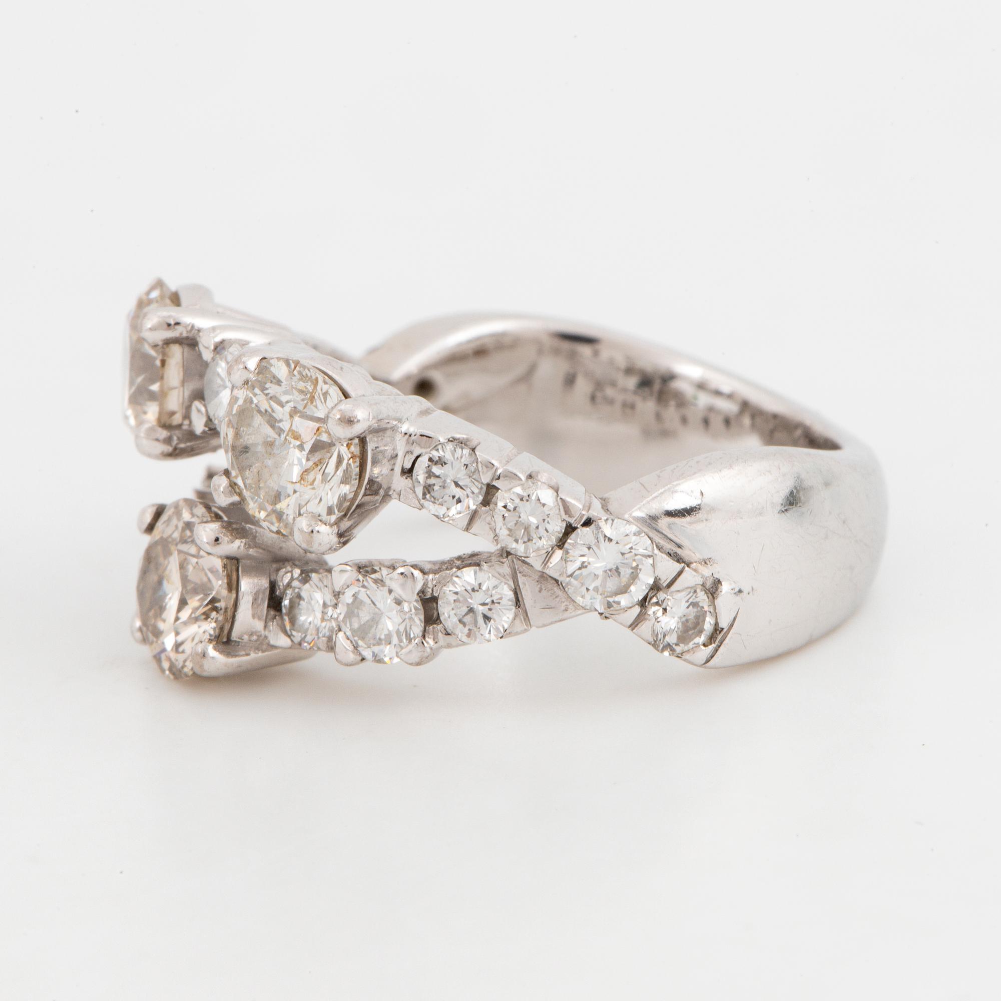 Round brilliant-cut diamond ring.
