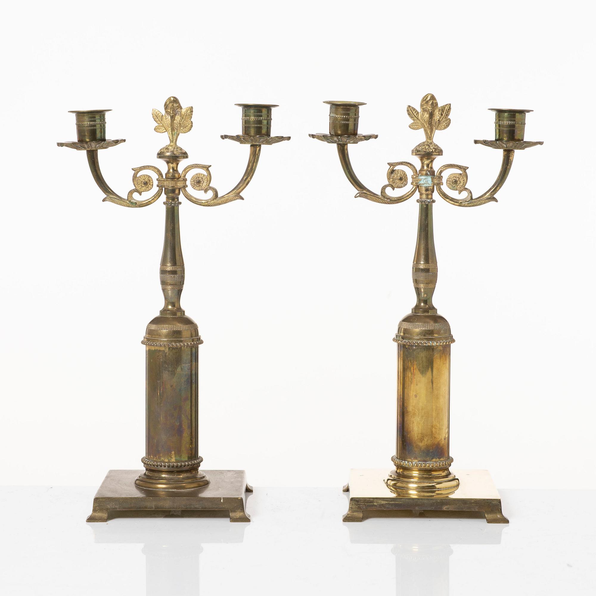 Candle holders, a pair of brass, Empire style, 20th century.