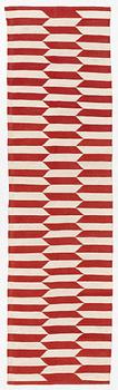 A runner, flat weave, a. 300 x 82 cm.