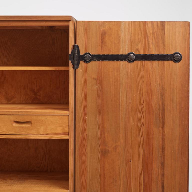 Axel Einar Hjorth, a stained pine "Lovö" cabinet, Nordiska Kompaniet, Sweden, 1930s.