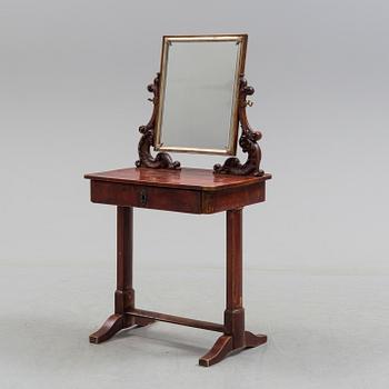A mid 19th century late empire dressing table.