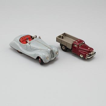 Two 1950s Schuco toy cars, Germany.