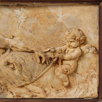 Claude Michel Clodion, attributed to, A relief depicting a nereid riding a dolphin alongside a triton blowing into a conch.