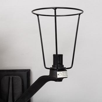 TOM DIXON, a pair of 'Base' wall light.