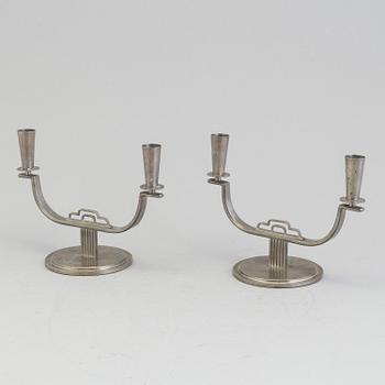 A pair of pewter candelabra by Carl Einar Borgström, Ystad Metall, marked CEB.