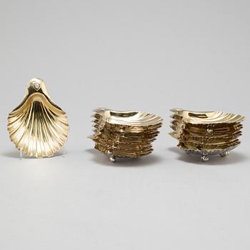 12 parcel-gilt silver caviar bowls by Gustaf Möllenborg and CG Hallberg, Stockholm, 1837-1904.