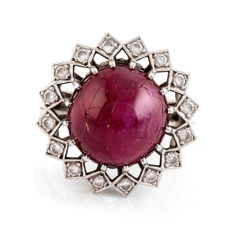 Ring, Strömdahls, with a cabochon-cut ruby and brilliant cut diamonds.