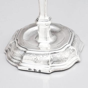 A pair of Swedish early 18th century silver candlesticks, mark of Petter Ersson Lund, Stockholm 1727.