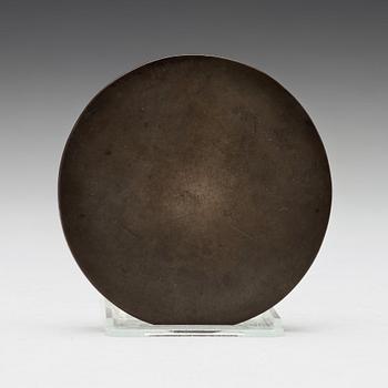 A bronze circular mirror with animals and inscription, Sui/early Tang dynasty (6th-7th Century).