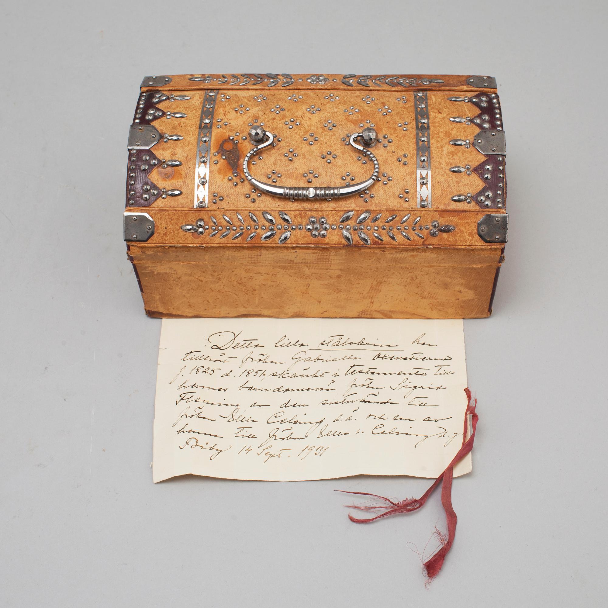 19th century leather box with steel decorations.