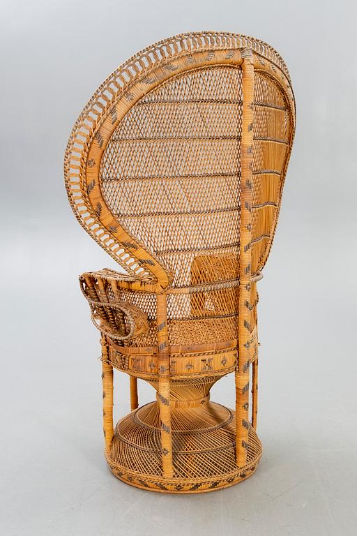 A mid 1900s wicker chair.