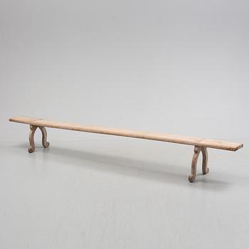 a 19th century wooden bench.