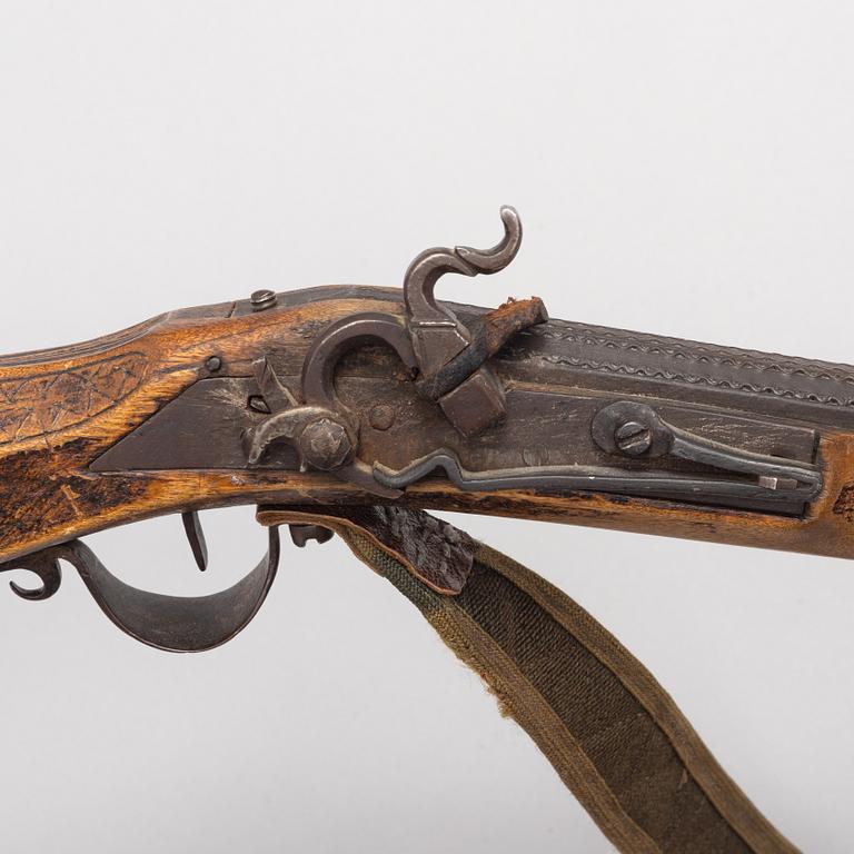 A Percussion rifle, 19th century.