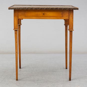 A Swedish late gustavian table. First half of the 19th century.