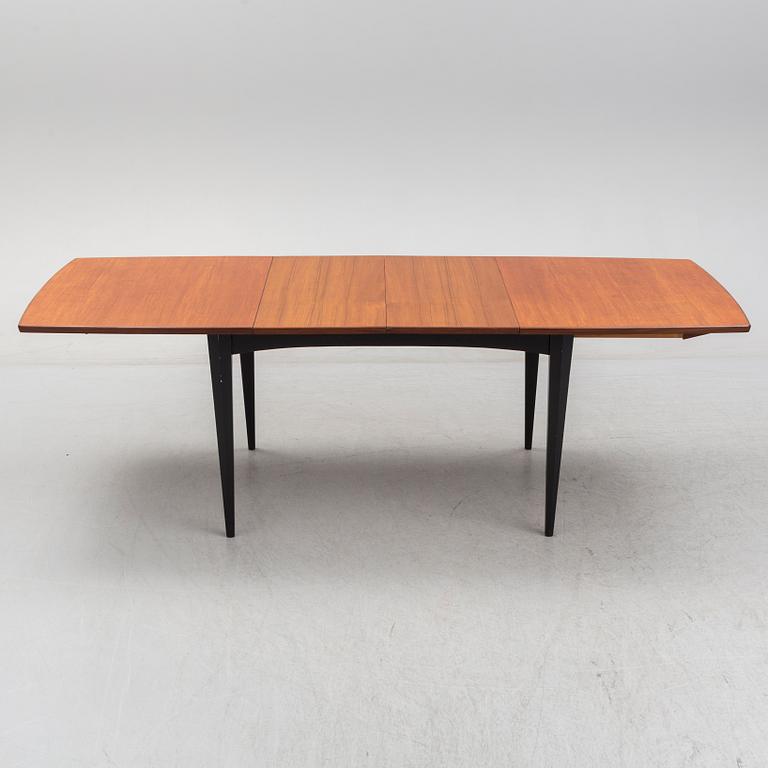 A 1950s/1960s teak and teak veneer table.