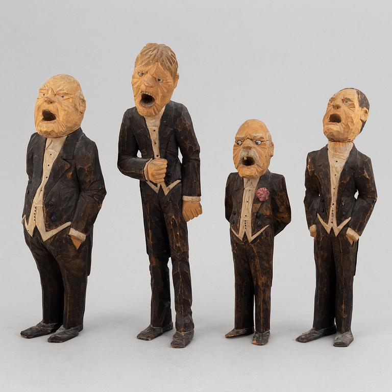 Four wooden sculptures by Axel Ericsson, signed and dated -29.