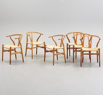A set of four + two armchairs 'Y-chair' by Hans J Wegner, Carl Hansen & Son, Denmark.