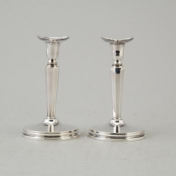 a pair if silver candlesticks by MGAB Uppsala 1962.