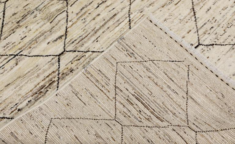 A Moroccan-design carpet, c. 205 x 145 cm.