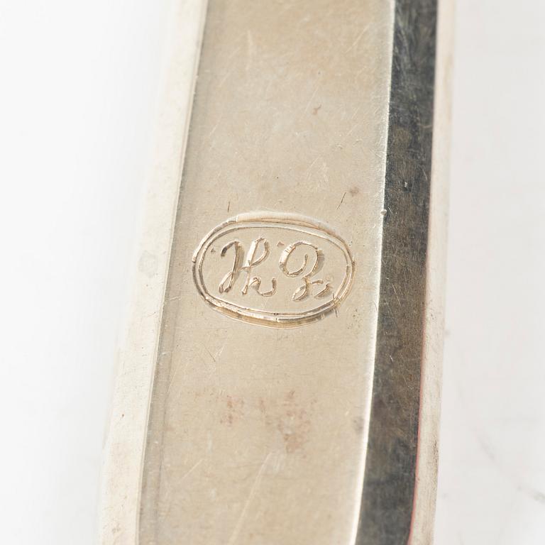 A Russian silver cutlery set, including mark of Ovchinnikov with the Imperial warrant, St Petersburg 1908-16 (24 pieces).