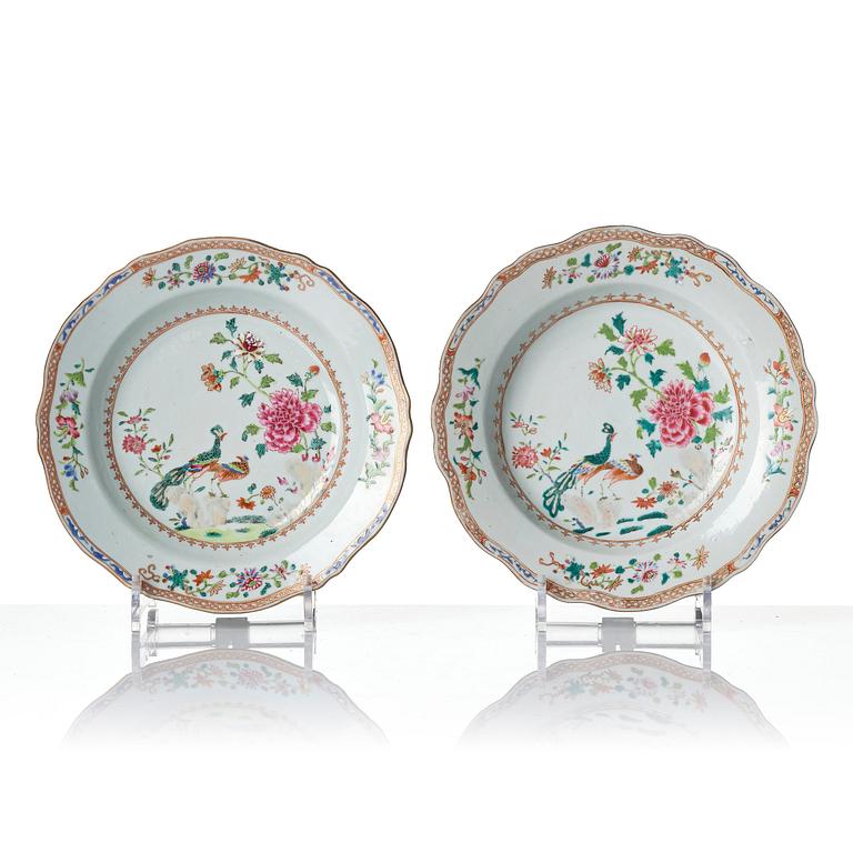 A set of six famille rose 'double peacock' soup dishes, Qing dynasty, Qianlong (1736-95).