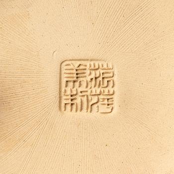 A group of three bright yellow yixing 'Gongfu' teapots, China, 1990s.