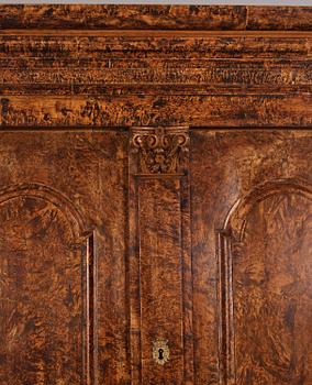 A Swedish late Baroque burr-alder cabinet, Stockholm, first part 18th century.