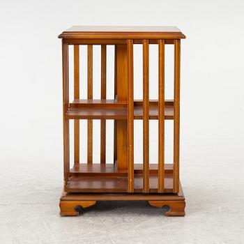 A revolving bookcase, late 20th century.