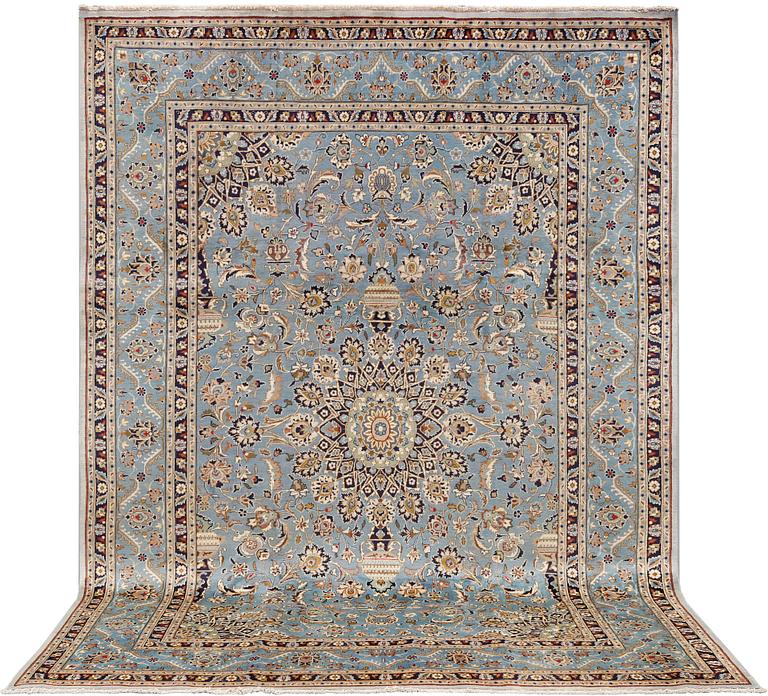 A Kashmar carpet, approximately 343 x 240 cm.