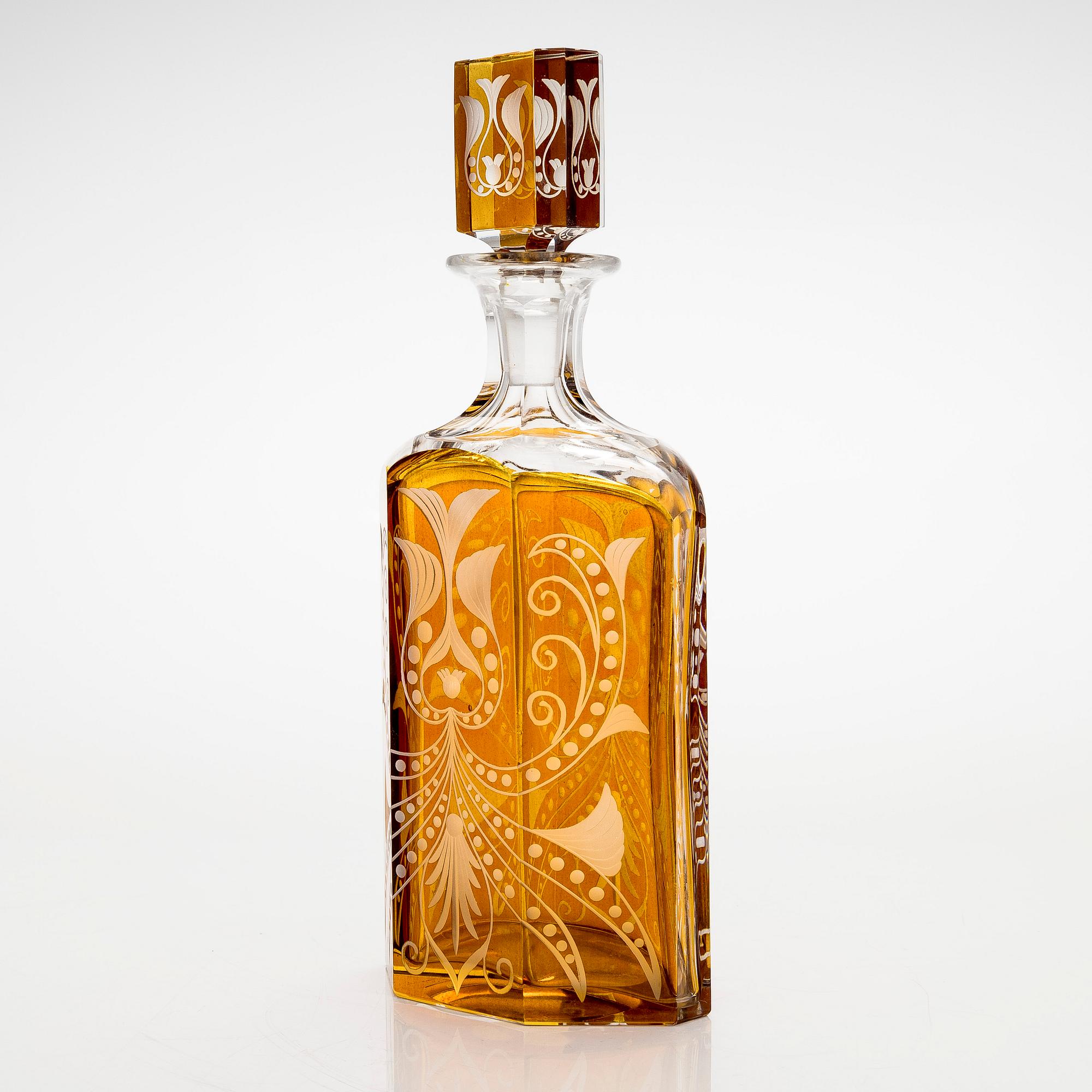 A decanter and four drinking glasses, signed TR Karhula 1943. Karhula Glassworks.