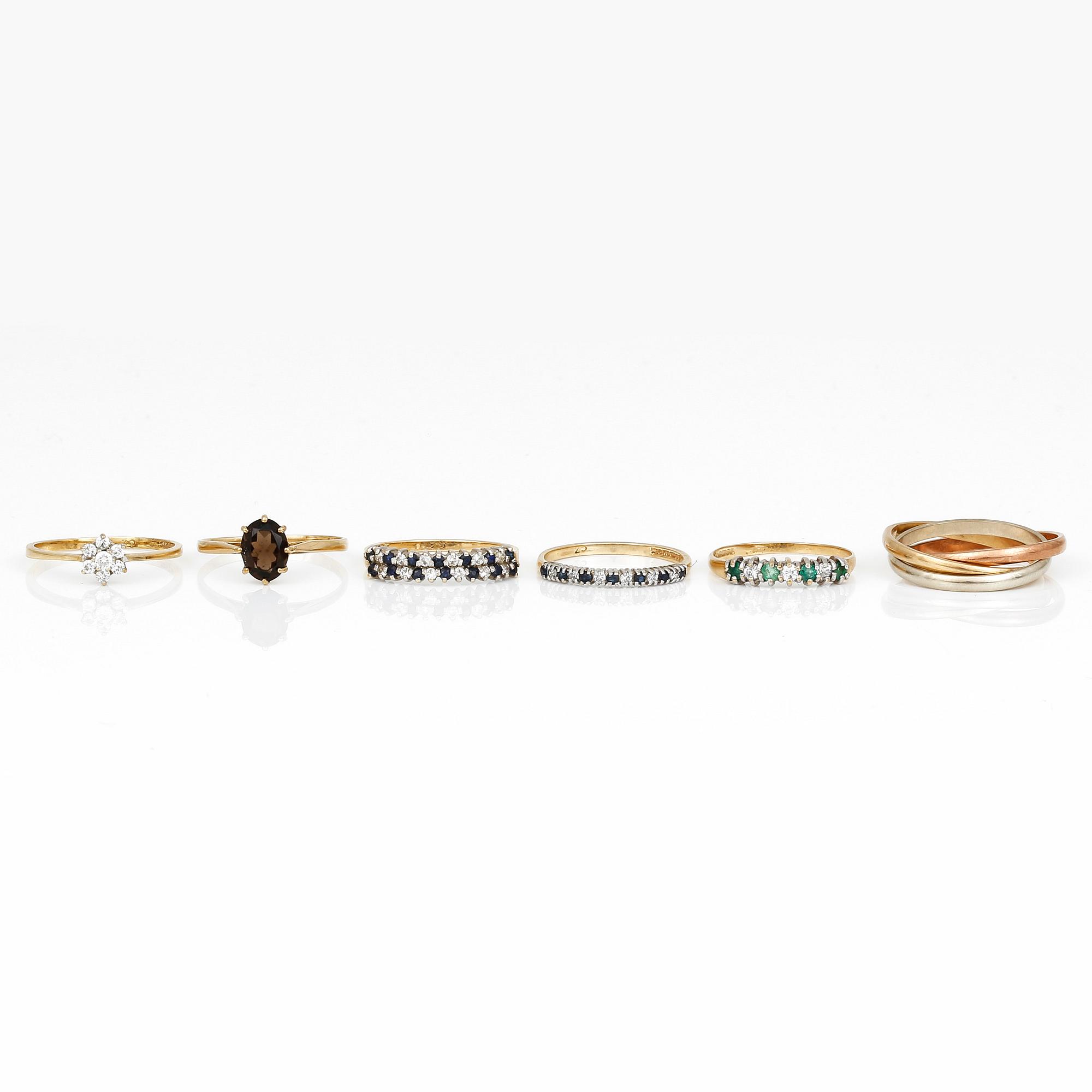 RINGAR, 6 st, mestadels 9K guld med smaragder, skapolit, cubic zirconia och troligen safirer. Total vikt ca 10,06 g.