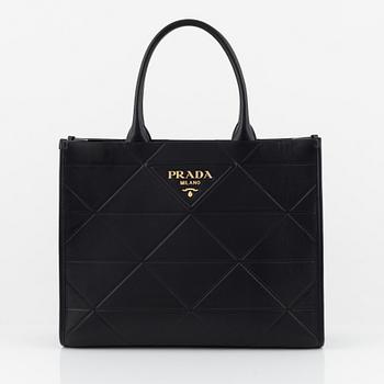 Prada, a black leather bag.
