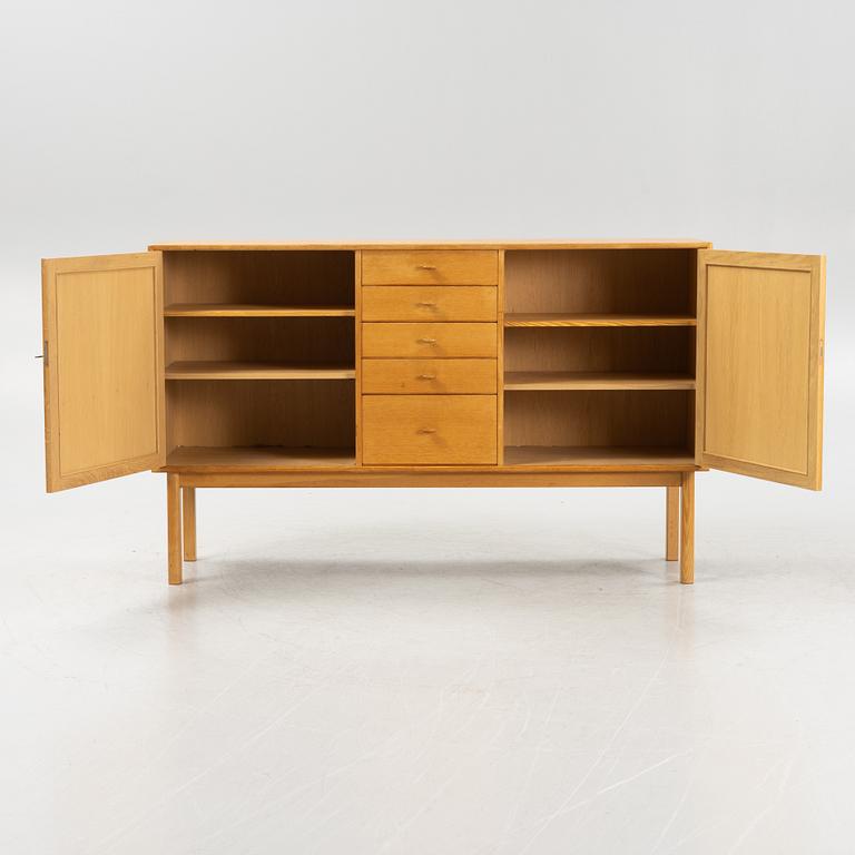 Sven Engström och Gunnar Myrstrand, an oak veneered sideboard, for Bodafors, dated 1962.