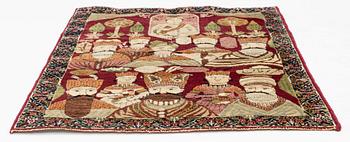 A Persian Kerman Laver 'Mashahir' ('The rulers of the world') rug, c. 82 x 63 cm.