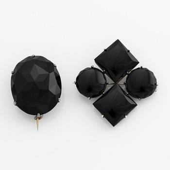 Sorgesmycken, collier, två broscher, silver med onyx.