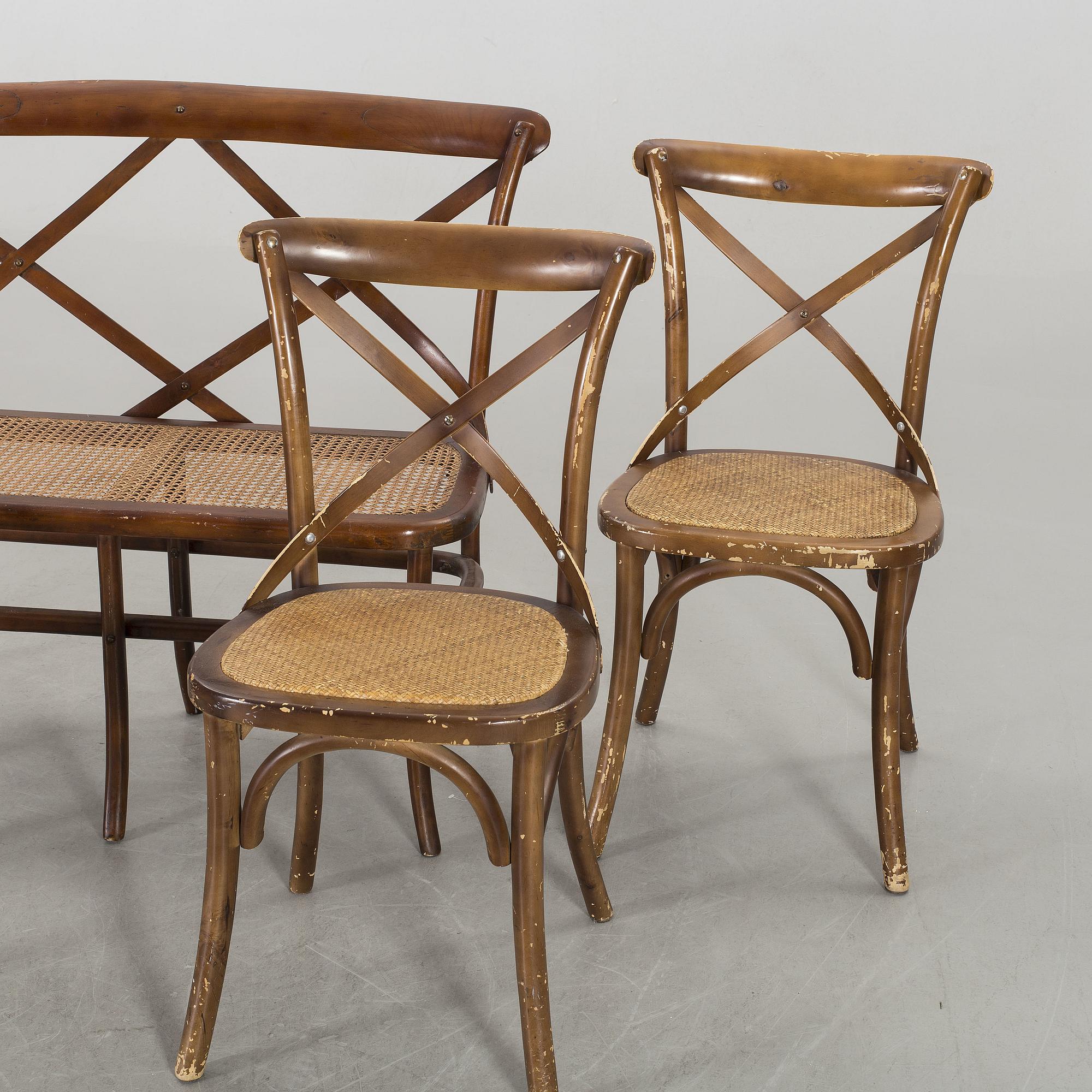 A wooden sofa, a table and four chairs, later part of the 20th century.